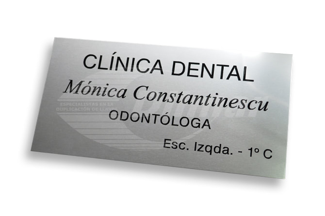 Placa grabada profesional odontólogo